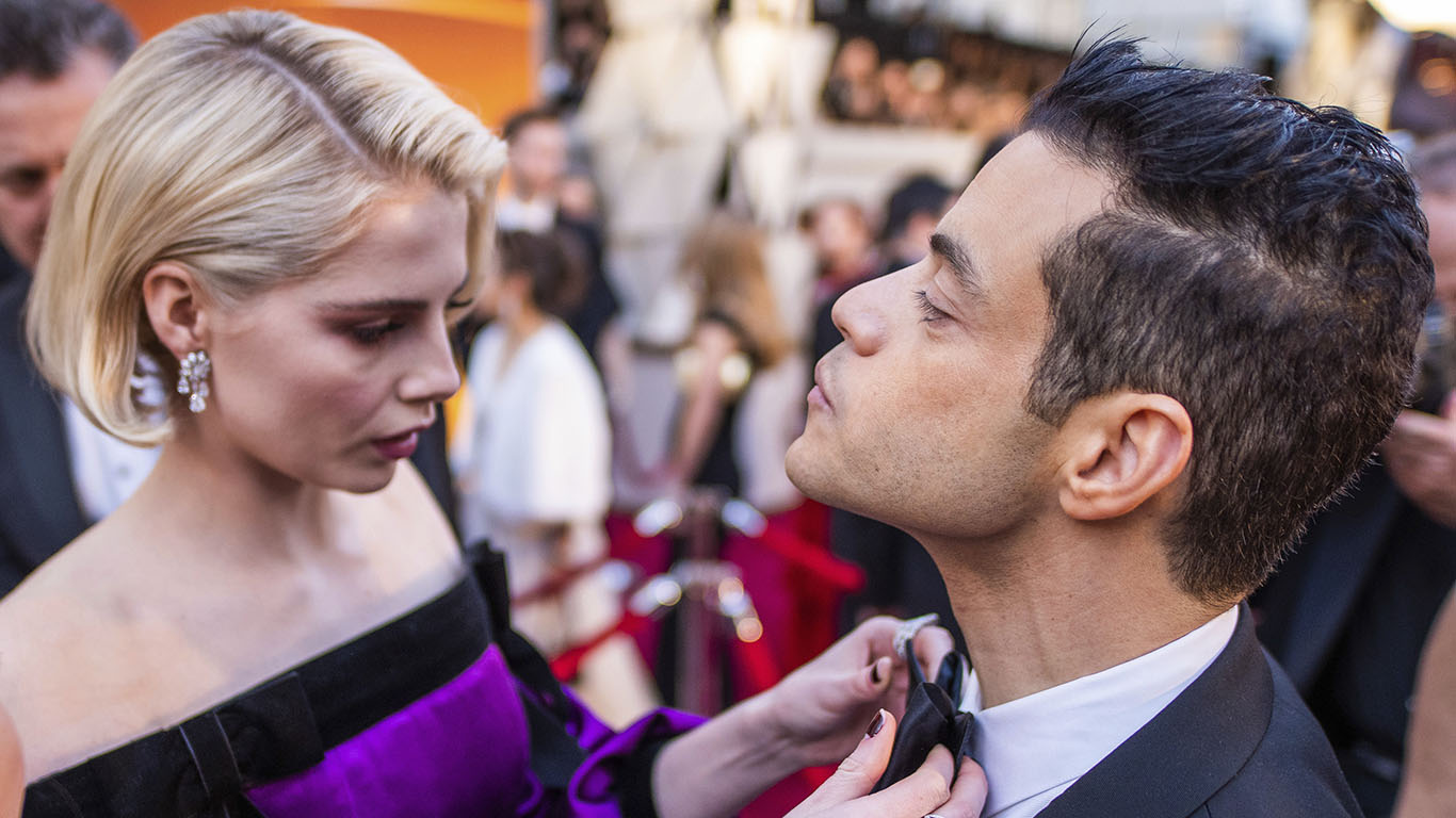 Lucy Boynton and Rami Malek arrive at the Oscars on Sunday, Feb. 24, 2019, at the Dolby Theatre in Los Angeles. (Photo by Charles Sykes/Invision/AP) Lucy Boynton and Rami Malek arrive at the Oscars