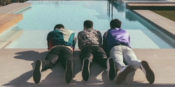 The Jonas Brothers share the new album art for their new album Happiness Begins.