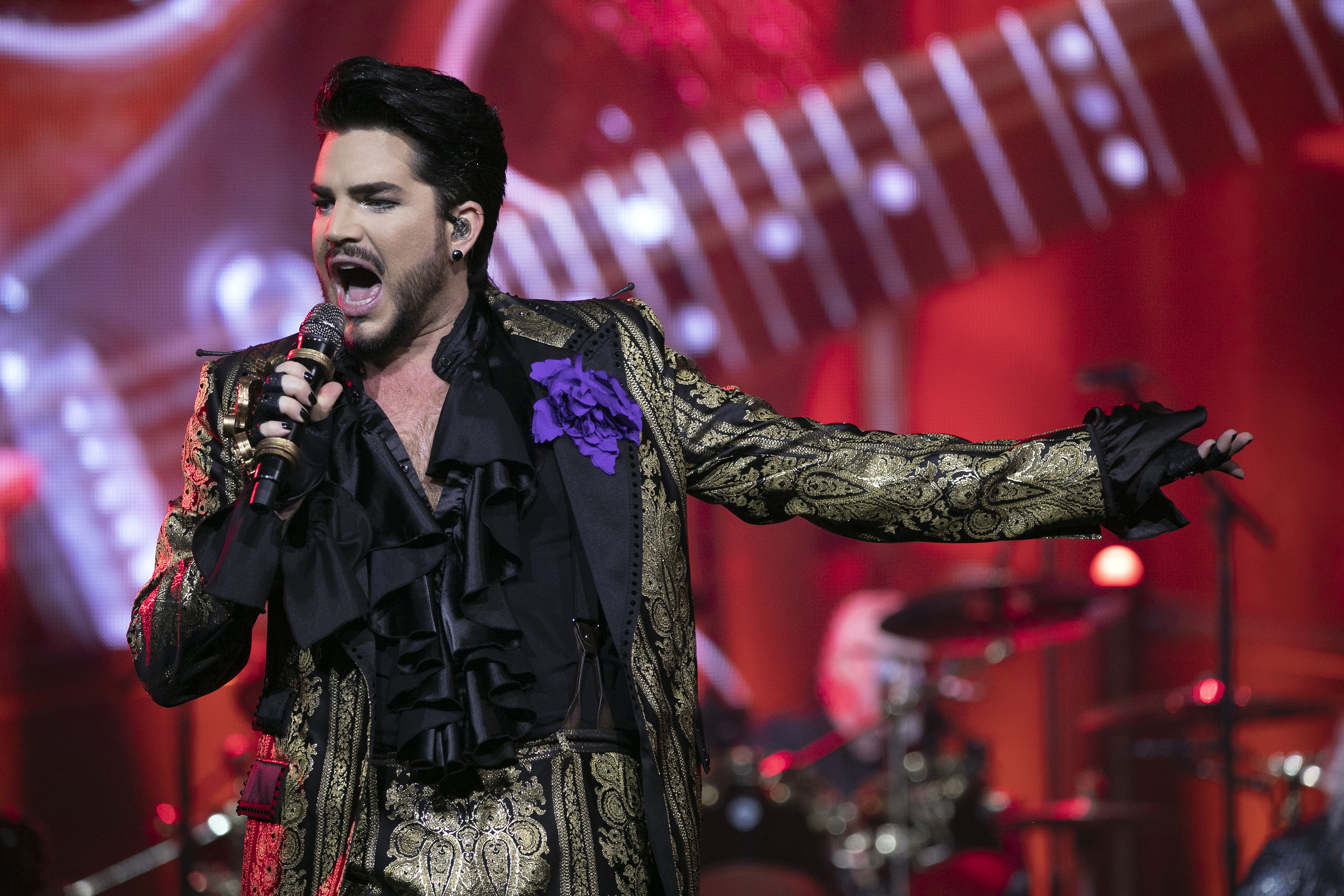 CHARLOTTE, NORTH CAROLINA - AUGUST 23: Singer Adam Lambert of Queen + Adam Lambert performs at Spectrum Center on August 23, 2019 in Charlotte, North Carolina. (Photo by Jeff Hahne/Getty Images)