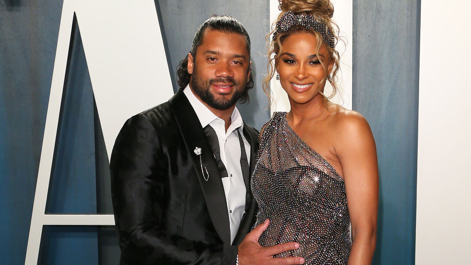 US singer Ciara and husband Russell Wilson attend the 2020 Vanity Fair Oscar Party following the 92nd Oscars at The Wallis Annenberg Center for the Performing Arts in Beverly Hills on February 9, 2020. (Photo by Jean-Baptiste Lacroix / AFP) (Photo by JEAN-BAPTISTE LACROIX/AFP via Getty Images)