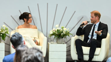 Prince Harry & Meghan Markle Smile In Return To New York City For World Mental Health Day
