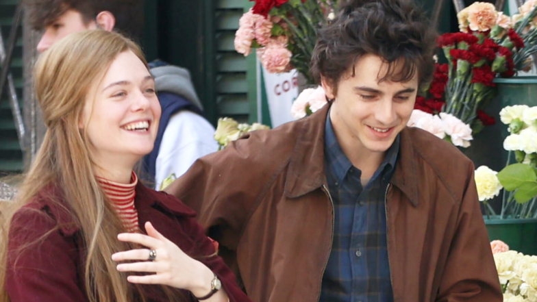 Timothée Chalamet Is Unrecognizable As Bob Dylan In New On-Set Biopic Photos With Elle Fanning